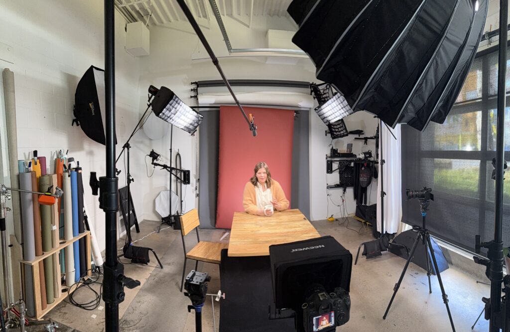 A lit DHC Media studio in Denver set up to film advertising video.