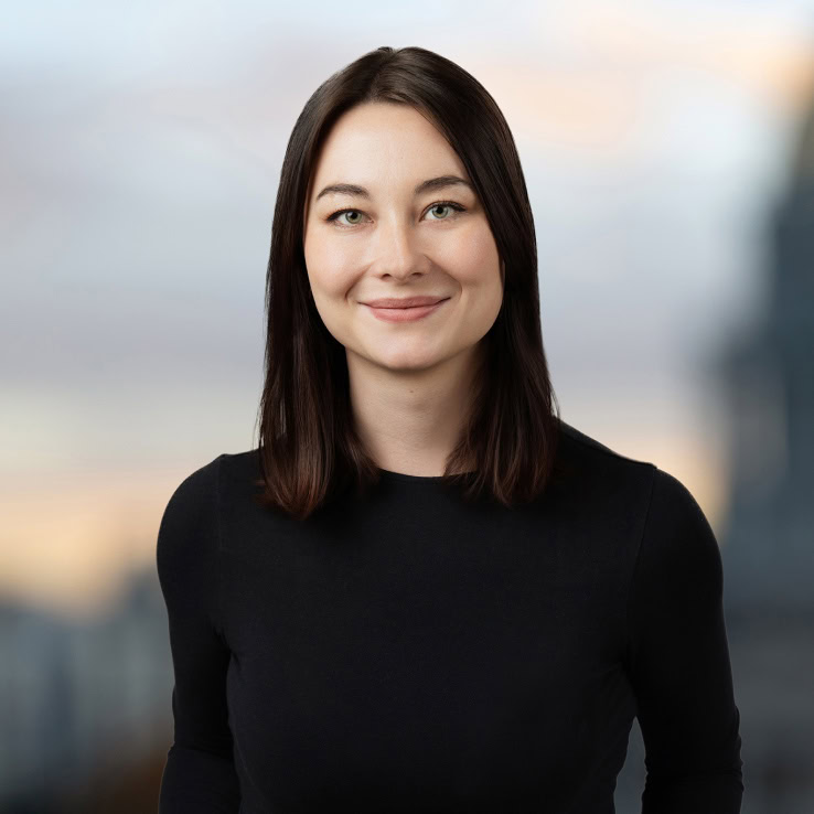 A Denver professional against the city skyline